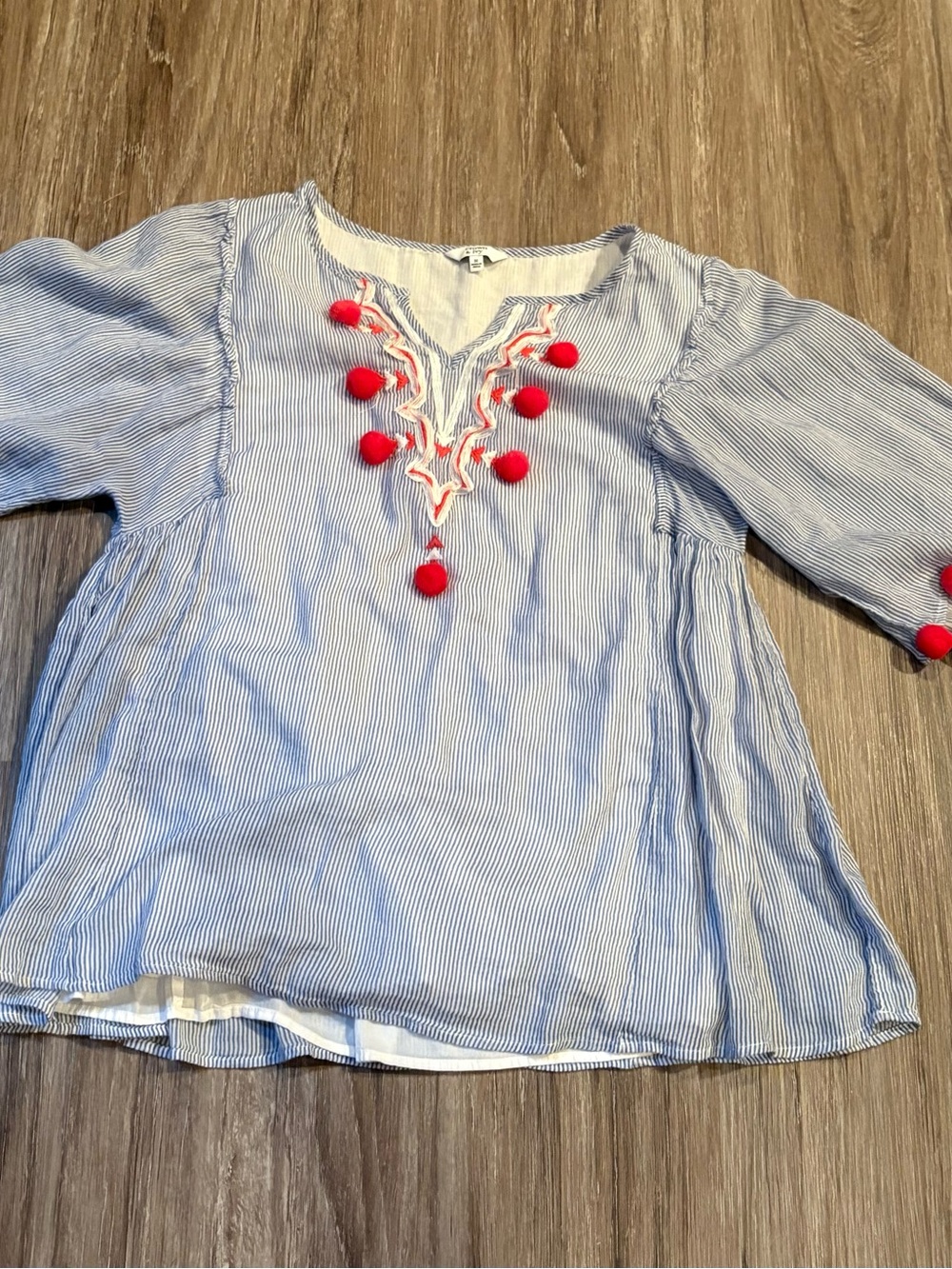 crown & ivy Blue and White Striped Peasant Top with Red Pom Poms